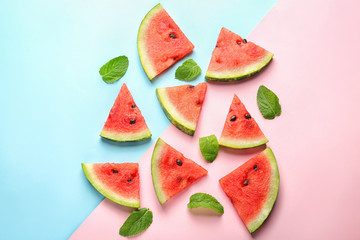 Delicious sliced watermelon on color background