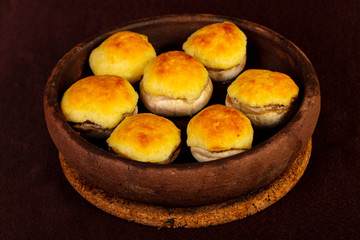 Baked champignons mushroom with cheese
