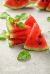 Sweet watermelon slices on table