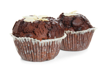 Sweet tasty chocolate muffins on white background