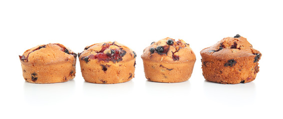 Sweet tasty muffins on white background