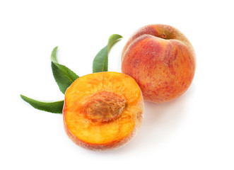 Fresh peaches on white background