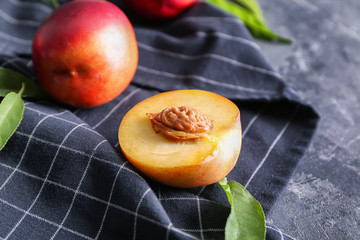 Fresh peaches on napkin, closeup