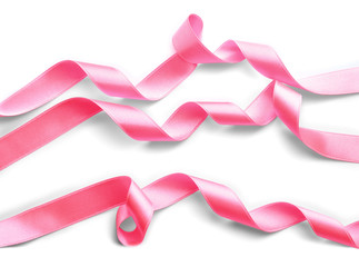 Pink satin ribbons on white background