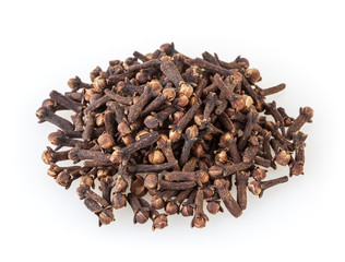 Heap of dried cloves isolated on white background