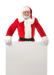 Portrait of Santa Claus with blank poster on white background