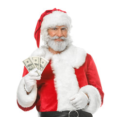 Santa Claus with dollar banknotes on white background
