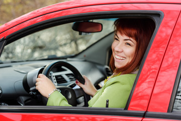  woman driving  car