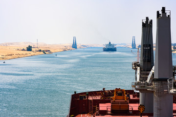 Cargo ship passing through Suez Canal, Egypt