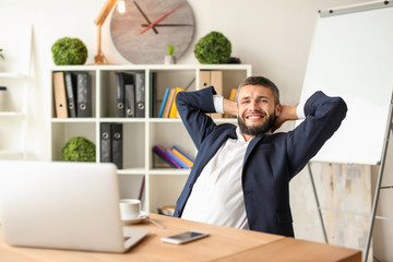 Businessman resting at workplace