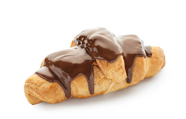 Tasty croissant with chocolate sauce on white background