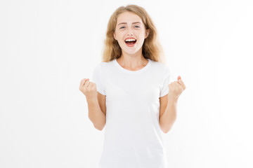Fototapeta premium Success concept. Very happy and excited young caucasian woman in blank template t shirt isolated on white background. Copy space. Mock up