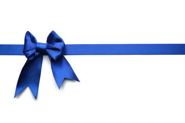 Blue ribbon with bow on white background