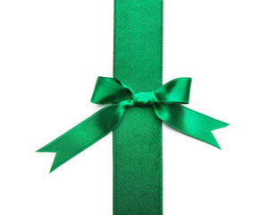 Green ribbon with bow on white background