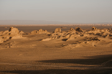 Sunrise in the Lut Desert (also Kalut desert), one of the driest and hottest places in the world.