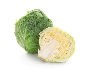 Fototapeta premium Whole and sliced cabbage on white background