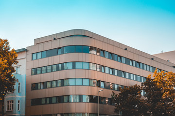 curved office building with steel facade