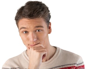 Portrait of young man in sweater isolated on white background