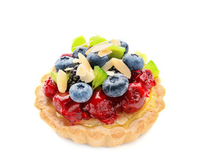 Delicious tart with fruit and berries on white background