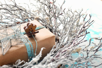 Christmas gift box and wreath, closeup