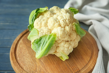 Fresh cauliflower on wooden board