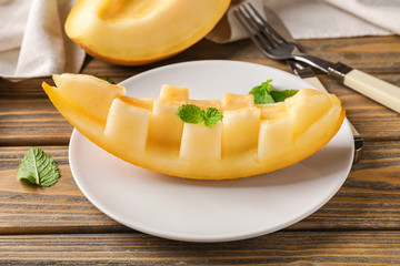 Sliced ripe melon on plate