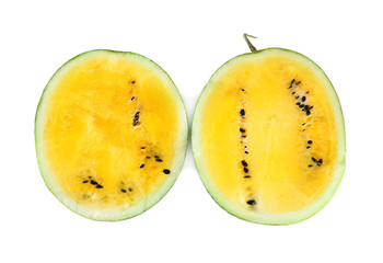 Halves of yellow watermelon on white background