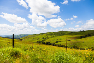 Fototapeta na wymiar The hills and mountainous terrain on the The R69 from Pongola to Vryheid, KZN, South Africa