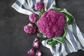 Purple cauliflower cabbage on grey table