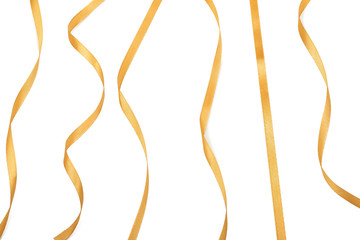 Golden ribbons on white background