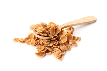 Spoon with healthy cornflakes on white background