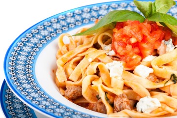 Spaghetti, tomato, cheese and basil