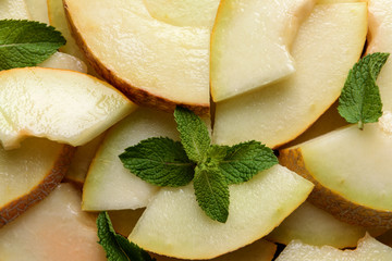 Slices of ripe melon with mint