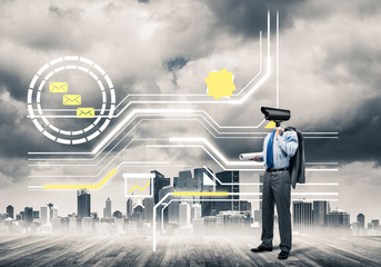 Camera headed man standing on wooden floor against modern citysc