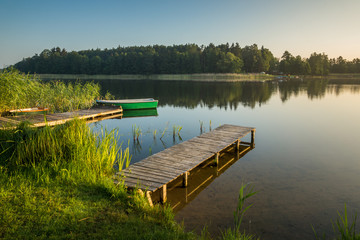 Footbridge on the Wydminskie lake in Wydminy, Masuria, Poland