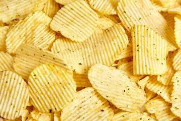 rippled potato chips with condiment