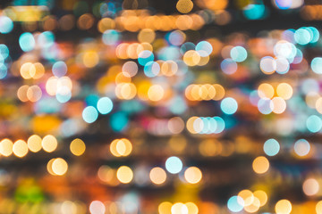 Blurry background of night market. Abstract and Decoration lighting concept. Christmas and New year theme.