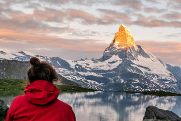 Morning shot of the golden Matterhorn (Monte Cervino, Mont Cervin) pyramid and  blue Stellisee...