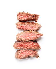 Tasty cut steak on white background