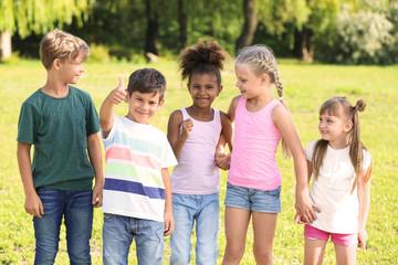Cute little children outdoors on summer day