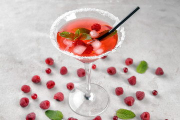 Fresh summer cocktail in glass on light table