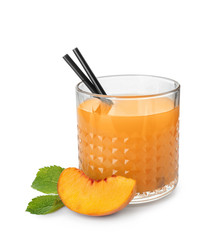 Peach juice in glass on white background