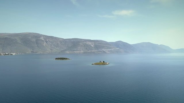 Aerial view of the St. Athanasios island in the Gulf of Corinth, Greece.