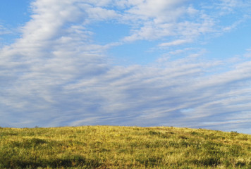 Fototapeta premium Summer landscape. Sky and hills. 