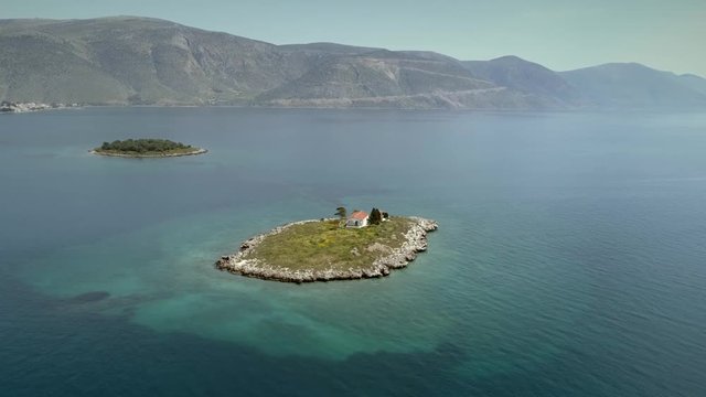 Aerial view of the St. Athanasios island in the Gulf of Corinth, Greece.