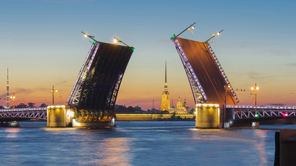 Fototapeta na wymiar Drawn Palace Bridge and Peter and Paul Fortress at white night, Saint Petersburg, Russia
