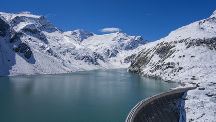 Stausee Mooserboden Kaprun, dam between snowy mountains