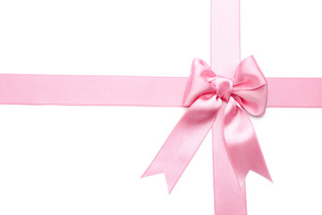 Pink ribbons with bow on white background