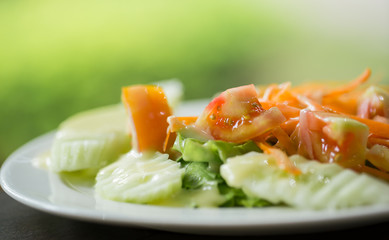 Salad of fresh vegetables on the table.
