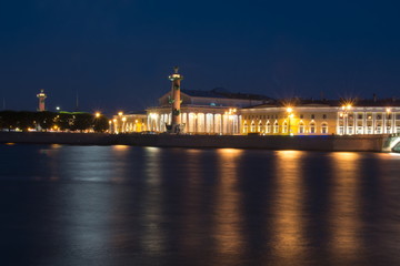 Fototapeta na wymiar Old Stock Exchange building and Rostral columns on Vasilyevsky island at night, Saint Petersburg, Russia